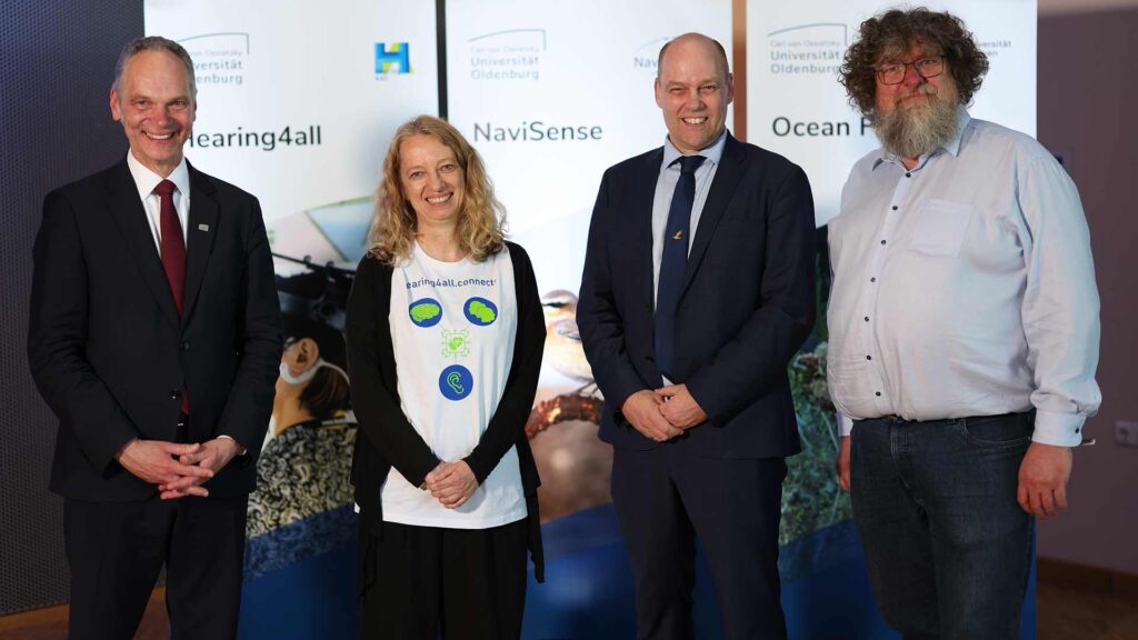 Delighted with the sensational success (from left to right): University President Ralph Bruder, Christiane Thiel, spokesperson for Hearing4all, Henrik Mouritsen, spokesperson for NaviSense, and Helmut Hillebrand, Oldenburg spokesperson for Ocean Floor. Copyright: Universität Oldenburg